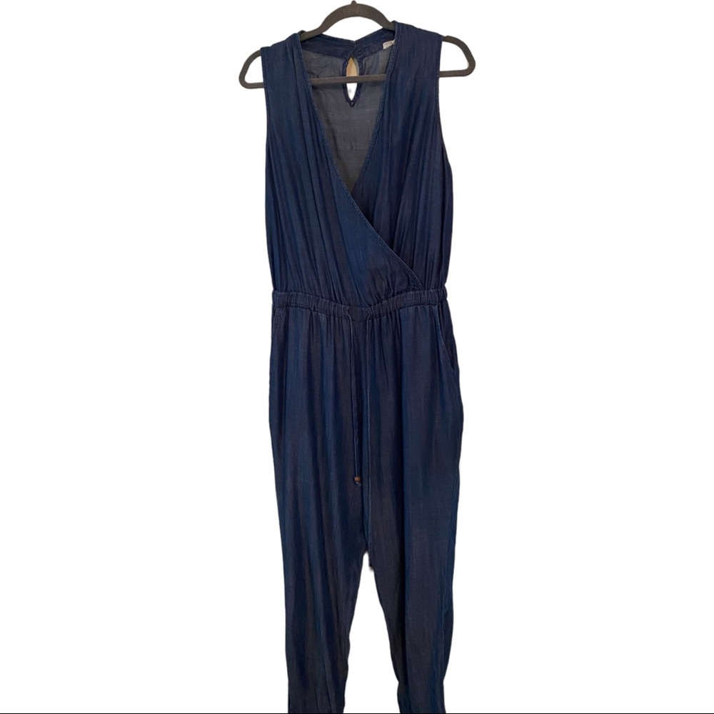 Blue jean jumpsuit. Designed for medium height. Worn once. Size medium regular